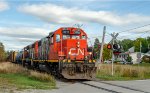 CN 4711*leads 559 at Rue Des Braves